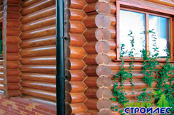 обработанная стена дома из оцилиндрованного бревна обработанная стена дома из оцилиндрованного бревна